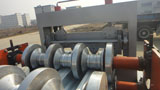 Metal panel roll forming machine